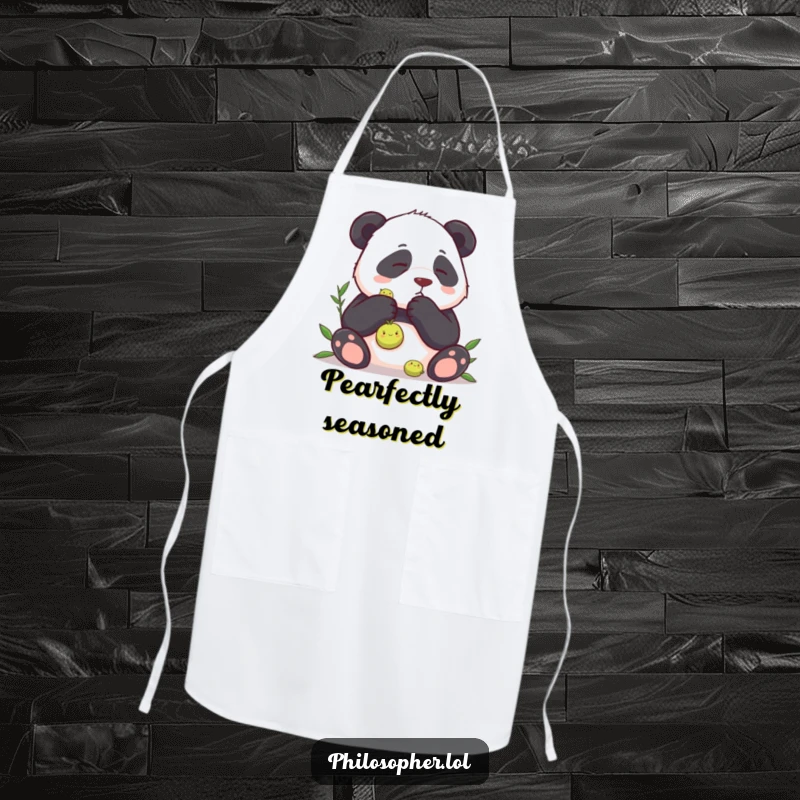 Funny apron showing a panda deep in culinary contemplation over a single pea, bringing humor to the kitchen.