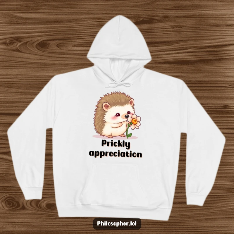 Funny wobbly hedgehog hoodie: a soft hoodie with a hedgehog wobbling near a flower, symbolizing gentle appreciation.