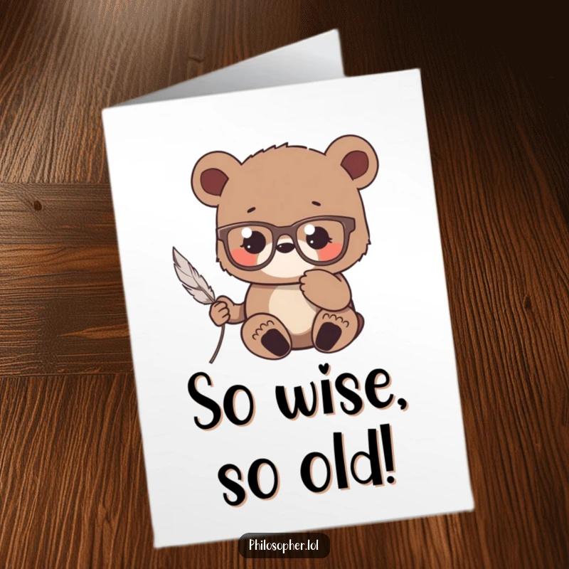 Funny free printable birthday card of a bear cub wearing reading glasses, looking intently at a single feather, deep in thought.