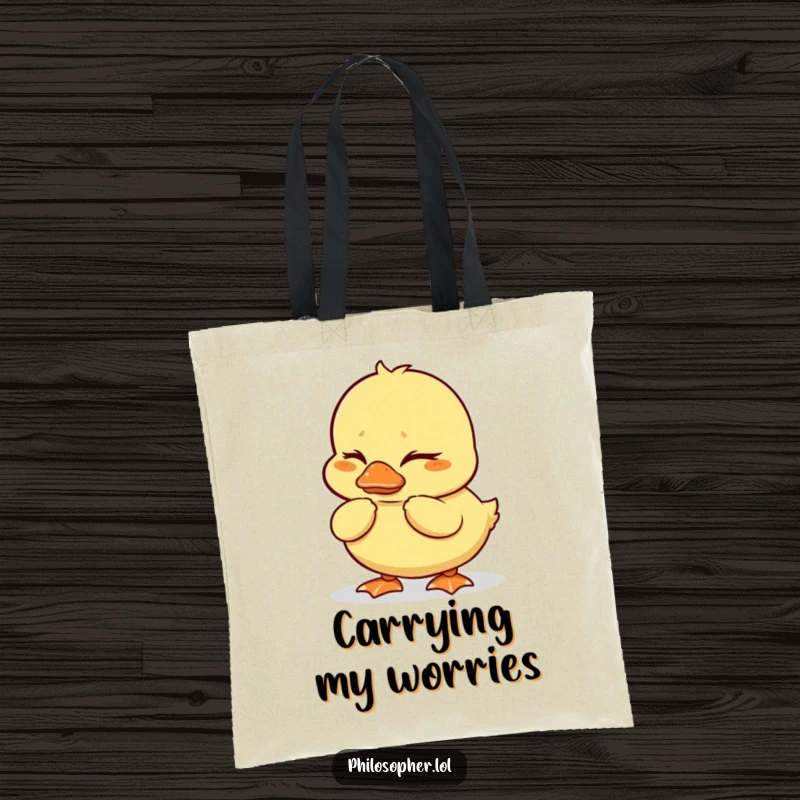 Funny duckling tote bag with a wobbly duckling furrowing its brows in deep thought, perfect for carrying essentials humorously.