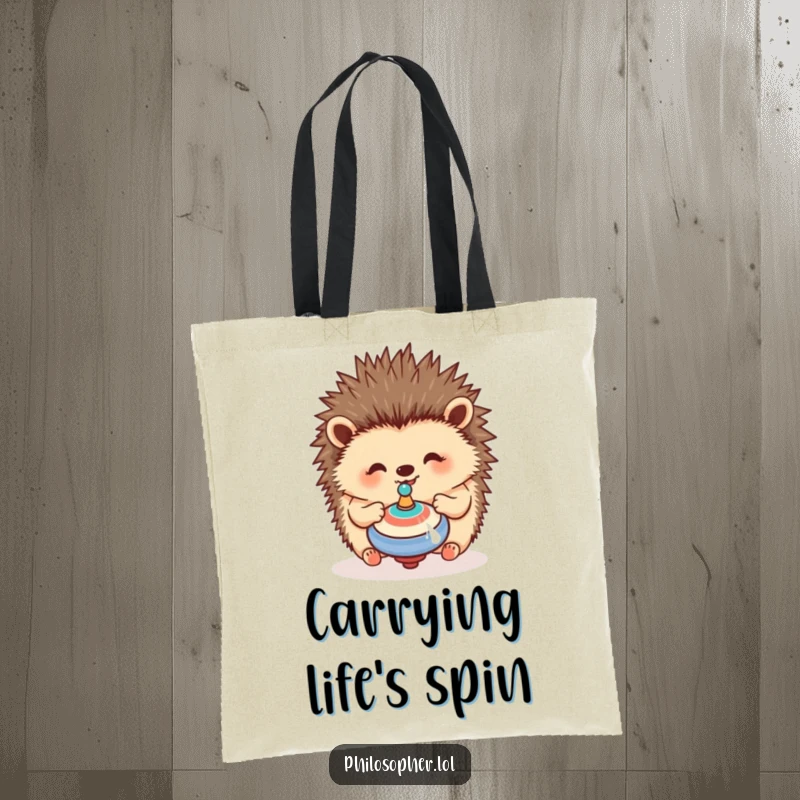 Funny hedgehog tote bag with a happy hedgehog contemplating a spinning top, perfect for carrying essentials humorously.
