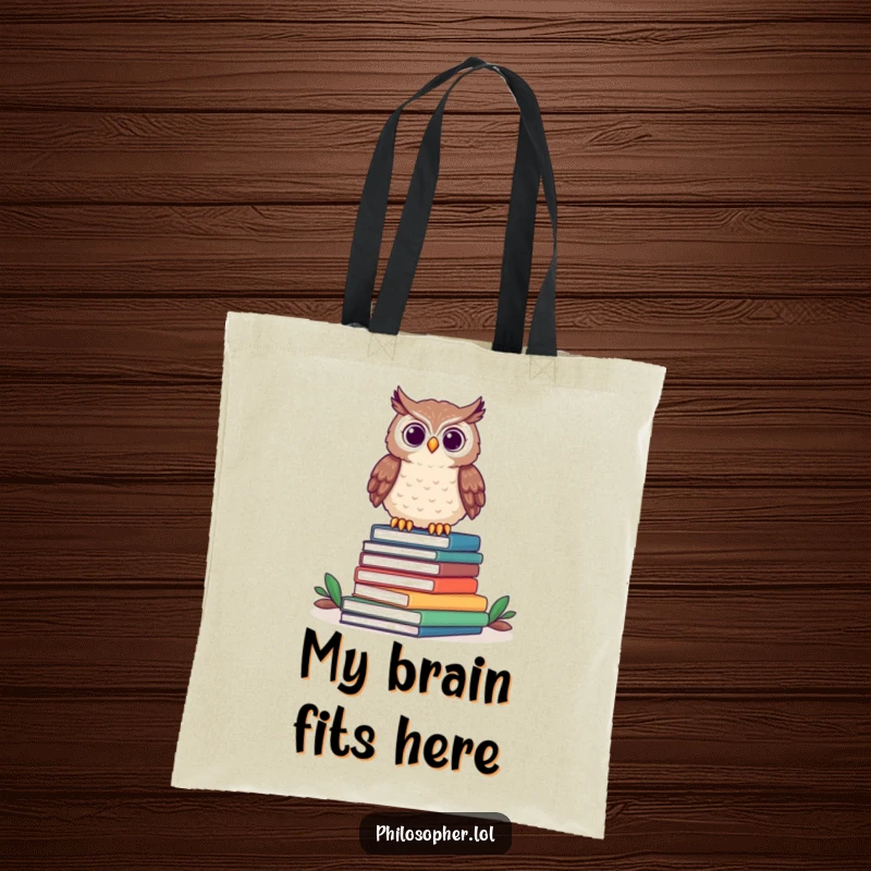 Funny owl tote bag with a proud owl perched on books, perfect for carrying novels and library finds.